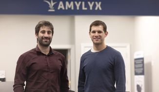 This 2018 photo provided by Amylyx shows the company&#39;s co-founders Joshua Cohen, left, and Justin Klee in Cambridge, Mass. On Friday, Sept. 2, 2022, federal health regulators remain unconvinced about the benefits of a closely watched experimental drug for the debilitating illness known as Lou Gehrig’s disease, even as they&#39;re set to give its maker, Amylyx, a rare second chance to make its case publicly. (Amylyx via AP)