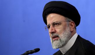 In this photo released by the official website of the office of the Iranian Presidency, President Ebrahim Raisi speaks during a press conference in Tehran, Iran, Monday, Aug. 29, 2022. In a rare news conference Monday marking his first year in office, Raisi warned that any roadmap to restore Tehran&#39;s tattered nuclear deal with world powers must see international inspectors end their probe on man-made uranium particles found at undeclared sites in the country. (Iranian Presidency Office via AP)wld