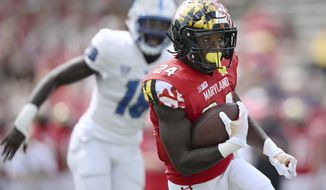 Maryland running back Roman Hemby runs the ball for a touchdown against Buffalo during an NCAA football game on Saturday, Sept. 3, 2022, in College Park, MD. (AP Photo/Gail Burton)
