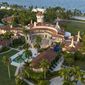 This is an aerial view of President Donald Trump&#39;s Mar-a-Lago estate, Aug. 10, 2022, in Palm Beach, Fla. The National Archives and Records Administration recovered 100 documents bearing classified markings, totaling more than 700 pages, from a initial batch of 15 boxes retrieved from Mar-a-Lago earlier this year. That&#39;s according to newly public correspondence with the Trump legal team. (AP Photo/Steve Helber, File)