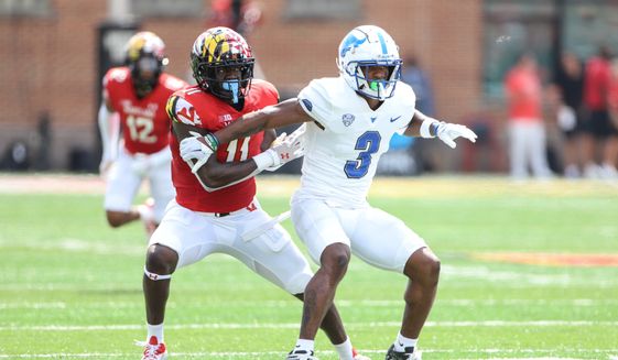 Maryland Terrapins&#39; LB Ruben Hyppolite III (11) stands behind Buffalo Bills WR Quian Williams (3) at the Maryland Terps Football vs the Buffalo Bulls at Capital One Field  at Maryland Stadium in College Park MD on September 3rd 2022 (Photo: Alyssa Howell)