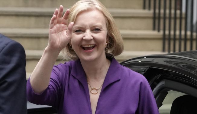 Liz Truss arrives at Conservative Central Office in Westminster after winning the Conservative Party leadership contest in London, Monday, Sept. 5, 2022. Liz Truss will become Britain&#x27;s new Prime Minister after an audience with Britain&#x27;s Queen Elizabeth II on Tuesday Sept. 6. (AP Photo/Kirsty Wigglesworth)