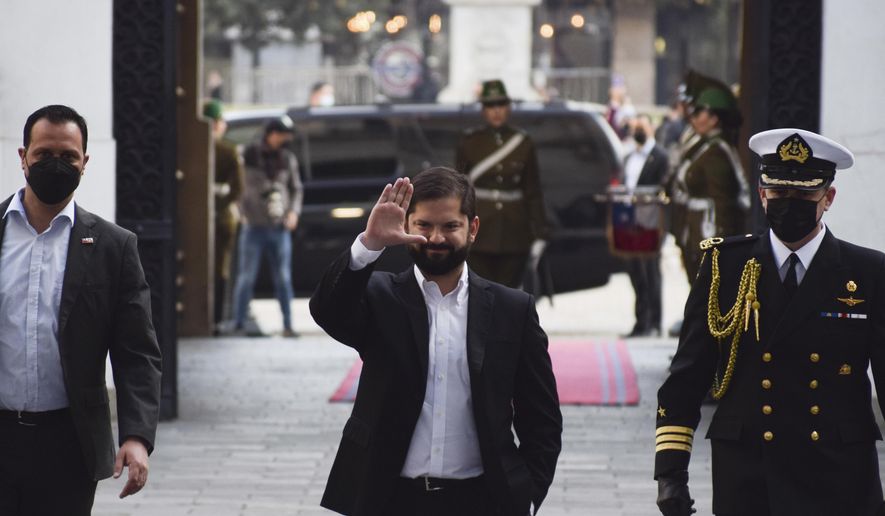 Chilean President Gabriel Boric arrives to his office at La Moneda presidential palace in Santiago, Chile, Monday, Sept. 5, 2022. Chileans overwhelmingly rejected a progressive new constitution to replace its dictatorship-era charter, dealing a blow to Boric, who made clear the process to amend it would not end with Sunday's vote. (AP Photo/Matias Basualdo)