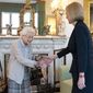 Britain&#39;s Queen Elizabeth II, left, welcomes Liz Truss during an audience at Balmoral, Scotland, where she invited the newly elected leader of the Conservative party to become Prime Minister and form a new government, Tuesday, Sept. 6, 2022. (Jane Barlow/Pool Photo via AP)