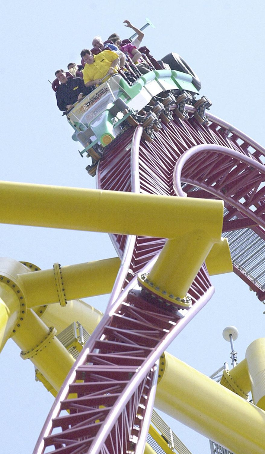 FILE - Amusement park goers ride Cedar Point's Top Thrill Dragster on May 1, 2003, in Sandusky, Ohio. The amusement park in Ohio is permanently closing the world’s second-tallest roller coaster. The decision announced Tuesday, Sept. 6, 2022, by Cedar Point comes a year after a small metal object flew off the 420-foot (128-meter) tall Top Thrill Dragster coaster and struck a woman in the head at the park in Sandusky. (Daniel Miller/The Sandusky Register via AP, File)