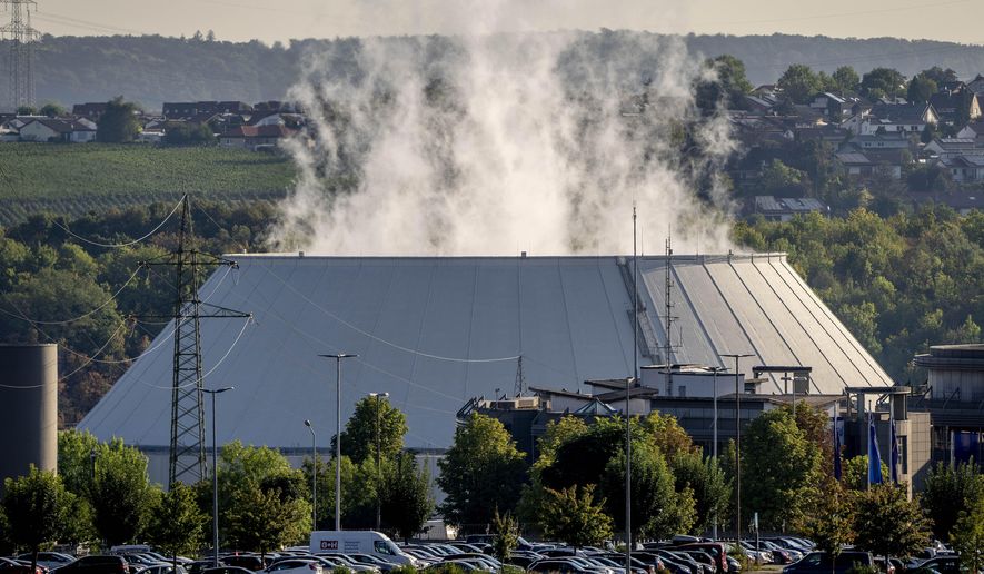 Smoke rises from the nuclear power plant of Nerckarwestheim in Neckarwestheim, Germany, on Aug. 22, 2022. Europe is staring an energy crisis in the face. The cause: Russia throttling back supplies of natural gas. European officials say it&#39;s a pressure game over their support for Ukraine after Russia&#39;s invasion. (AP Photo/Michael Probst, File)