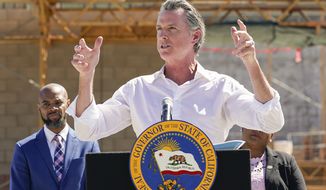 Governor Gavin Newsom talks to reporters during a press conference at the construction site of a water desalination plant in Antioch, Calif., Thursday, Aug. 11, 2022. (AP Photo/Godofredo A. Vásquez)