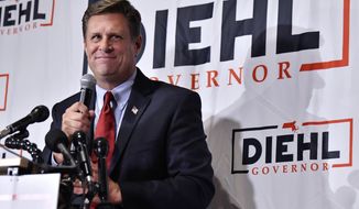 Republican candidate for Governor Geoff Diehl speaks to reporters at his primary night victory party, Tuesday, Sept. 6, 2022 in Weymouth, Mass. Diehl, a former GOP state representative from Whitman, Masss., who has been endorsed by Donald Trump, beat businessman Chris Doughty for the chance to replace incumbent Republican Gov. Charlie Baker, who&#39;s opted not to seek a third term. (AP Photo/Josh Reynolds)
