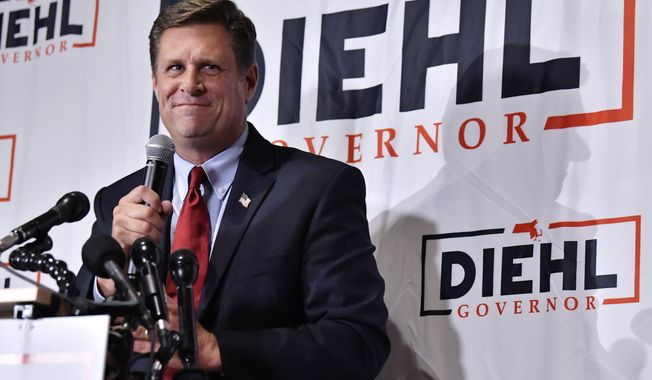 Republican candidate for Governor Geoff Diehl speaks to reporters at his primary night victory party, Tuesday, Sept. 6, 2022 in Weymouth, Mass. Diehl, a former GOP state representative from Whitman, Masss., who has been endorsed by Donald Trump, beat businessman Chris Doughty for the chance to replace incumbent Republican Gov. Charlie Baker, who&#x27;s opted not to seek a third term. (AP Photo/Josh Reynolds)