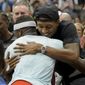 Washington Wizards guard Bradley Beal, right, hugs Frances Tiafoe, of the United States, after Tiafoe defeated Andrey Rublev, of Russia, during the quarterfinals of the U.S. Open tennis championships, Wednesday, Sept. 7, 2022, in New York. (AP Photo/Mary Altaffer)