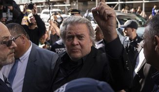 Former White House strategist Steve Bannon, arrives at court, Thursday, Sept. 8, 2022, in New York. Bannon surrendered to New York authorities, and is expected to be charged in border wall scheme.  (AP Photo/Yuki Iwamura)