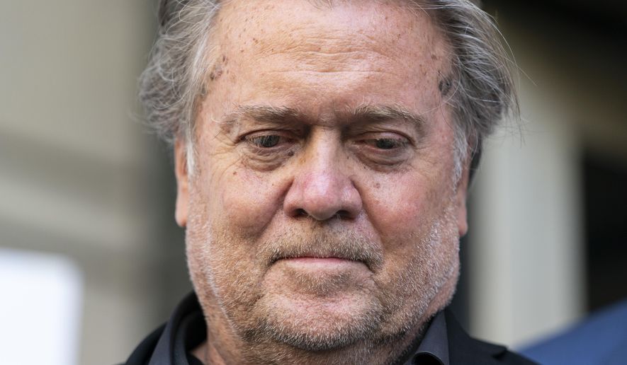 Former White House strategist Steve Bannon pauses as he departs federal court on Friday, July 22, 2022, in Washington. Bannon, former President Donald Trump’s longtime ally, is expected to turn himself in to authorities Thursday, Sept. 8 to face fresh charges that he duped donors who gave money to build a wall on the U.S.-Mexico border. (AP Photo/Alex Brandon, File)