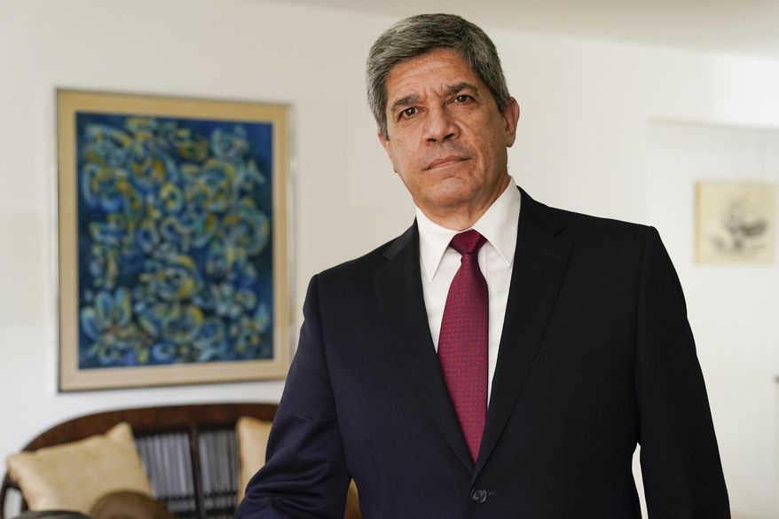 Cuban Deputy Foreign Minister Carlos Fernandez de Cossio is interviewed by The Associated Press on Friday, April 22, 2022, in Washington. De Cossio accused the Biden administration on Wednesday, Sept. 7, 2022, of acting immorally, illegitimately and unfairly by keeping Cuba on the list of state sponsors of terrorism, claiming it has been a victim of state-sponsored terrorism by the United States for more than 60 years. (AP Photo/Jacquelyn Martin, File)