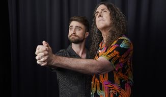 Daniel Radcliffe, left, and &amp;quot;Weird Al&amp;quot; Yankovic strike a pose for a portrait at the Bisha Hotel, during the Toronto International Film Festival, Thursday, Sept. 8, 2022, in Toronto. Radcliffe plays Yankovic in the film &amp;quot;Weird: The Al Yankovic Story.&amp;quot; (AP Photo/Chris Pizzello)