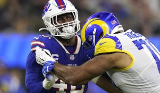 Buffalo Bills tight end Zach Davidson, left, tries to get by Los Angeles Rams offensive tackle Joe Noteboom during an NFL football game Thursday, Sept. 8, 2022, in Inglewood, Calif. (AP Photo/Mark J. Terrill)