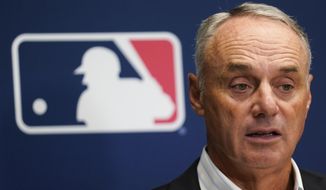 Major League Baseball Commissioner Rob Manfred speaks to reporters following an owners&#39; meeting at MLB headquarters in New York, June 16, 2022. MLB said it is prepared to voluntarily accept the formation of a minor league union, a key step that will lead to collective bargaining and possibly a strike threat at the start of next season. Manfred said the sport was in the process of notifying the MLB Players Association, which launched the unionization drive on Aug. 28, 2022. (AP Photo/Seth Wenig, File) **FILE**