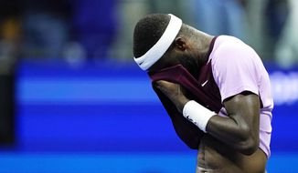 Frances Tiafoe, of the United States, reacts after losing to Carlos Alcaraz, of Spain, in the semifinals of the U.S. Open tennis championships, Friday, Sept. 9, 2022, in New York. (AP Photo/Matt Rourke)