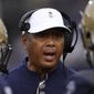 Navy head coach Ken Niumatalolo talks to his players during the second half of an NCAA college football game against Memphis, Saturday, Sept. 10, 2022, in Annapolis, Md. Memphis won 37-13. (AP Photo/Nick Wass) **FILE**