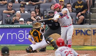 St. Louis Cardinals&#x27; Albert Pujols (5) hits a two-run home run off Pittsburgh Pirates relief pitcher Chase De Jong during the ninth inning of a baseball game in Pittsburgh, Sunday, Sept. 11, 2022. (AP Photo/Gene J. Puskar)