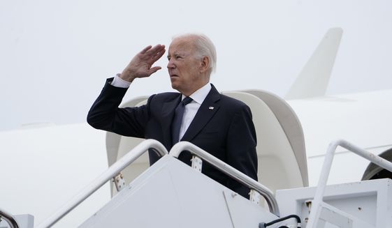 President Joe Biden salutes as he boards Air Force One at Delaware Air National Guard Base in New Castle, Del., Sunday, Sep. 11, 2022. Biden will mark the 21st anniversary of the Sept. 11 attacks at the Pentagon. Sunday&#39;s somber commemoration comes a little more than a year after the Democratic president ended the war in Afghanistan launched by the U.S. and its allies in response to the terror attacks. (AP Photo/Manuel Balce Ceneta)
