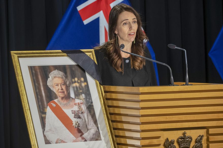 New Zealand Prime Minister Jacinda Ardern addresses a press conference after news of the passing of Queen Elizabeth II at the Beehive in Wellington, New Zealand, Friday, Sept. 9, 2022. Queen Elizabeth II, Britain&#39;s longest-reigning monarch and a rock of stability in a turbulent era for her country and the world, died Thursday, Sept. 8 after 70 years on the throne. She was 96. (Mark Mitchell/New Zealand Herald via AP)