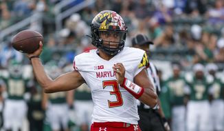 Maryland quarterback Taulia Tagovailoa looks to pass against Charlotte during an NCAA college football game in Charlotte, N.C., Saturday, Sept. 10, 2022. (AP Photo/Nell Redmond)