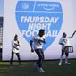 Robert &amp;quot;Bojo&amp;quot; Ackah, center, and Fik-Shun, left, perform during the announcement of the first Thursday Night Football on Prime Video matchup featuring the San Diego Chargers at Kansas City Chiefs at the 2022 NFL Draft on Thursday, April 28, 2022 in Las Vegas. The Thursday night, Sept. 15 game between the Los Angeles Chargers and Kansas City Chiefs kicks off Amazon Prime Video&#x27;s 11-year agreement with the NFL to carry “Thursday Night Football&amp;quot;. (AP Photo/Vera Nieuwenhuis, File)