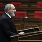 Armenian Prime Minister Nikol Pashinyan delivers his speech at the National Assembly of Armenia in Yerevan, Armenia, Tuesday, Sept. 13, 2022. Armenia&#39;s prime minister says that 49 soldiers have been killed in nighttime attacks by Azerbaijan. (Tigran Mehrabyan/PAN Photo via AP)
