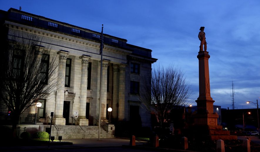 A monument to Confederate soldiers stands in front of the Alamance County Courthouse in Graham, N.C., on March 9, 2020. A North Carolina judge on Tuesday, Sept. 13, 2022, dismissed a lawsuit by the state NAACP that sought the removal of the Confederate statue in front of the historic courthouse. The lawsuit argued that the statue in front of the Alamance County Courthouse was a danger to public safety and violated constitutional rights to equal protection, according to The Times-News. (AP Photo/Jacquelyn Martin, File)