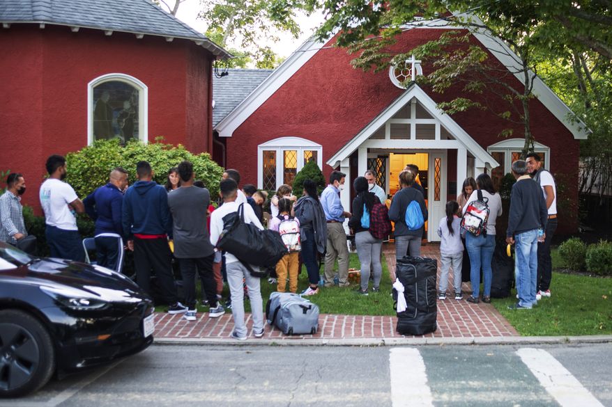 Immigrants gather with their belongings outside St. Andrews Episcopal Church, Wednesday Sept. 14, 2022, in Edgartown, Mass., on Martha&#39;s Vineyard. Florida Gov. Ron DeSantis on Wednesday flew two planes of immigrants to Martha&#39;s Vineyard, escalating a tactic by Republican governors to draw attention to what they consider to be the Biden administration&#39;s failed border policies. (Ray Ewing/Vineyard Gazette via AP) ** FILE **