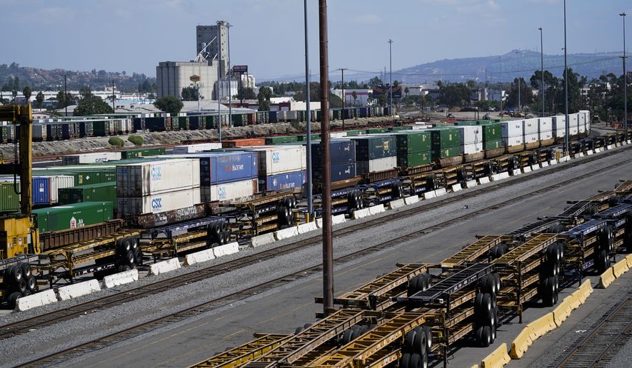 Freight train cars sit in a Union Pacific rail yard on Wednesday, Sept. 14, 2022, in Commerce, Calif. (AP Photo/Ashley Landis)