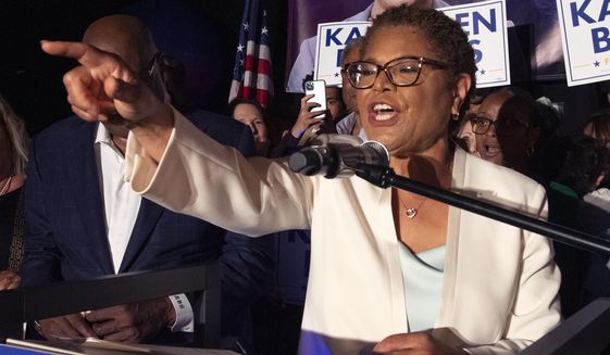 In this file photo, Rep. Karen Bass, D-Calif., speaks during her primary-night party June 7, 2022, in Los Angeles. Police arrested two men in connection with a burglary at the Los Angeles home of Bass last week, authorities said Wednesday, Sept. 14. The men were arrested Tuesday after investigators saw them get into a vehicle that had been parked at the home during the burglary. (AP Photo/John McCoy, File)  **FILE**