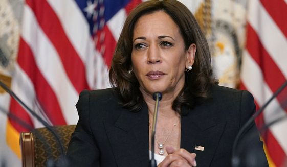 In this file photo, Vice President Kamala Harris listens during a meeting with civil rights and abortion rights leaders in the Diplomatic Reception Room on the White House complex in Washington, Sept. 12, 2022. Two buses of migrants from the U.S.-Mexico border were dropped off near Harris&#39; home in residential Washington on Thursday, Sept. 15. Another busload was dropped off at her residence on Saturday, Sept. 17. (AP Photo/Susan Walsh, File)  **FILE**
