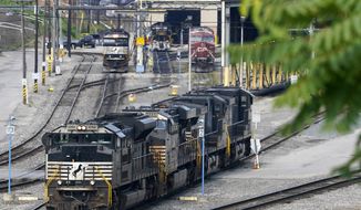 Norfolk Southern locomotives are moved in the Conway Terminal in Conway, Pa., Thursday, Sept. 15, 2022. (AP Photo/Gene J. Puskar)