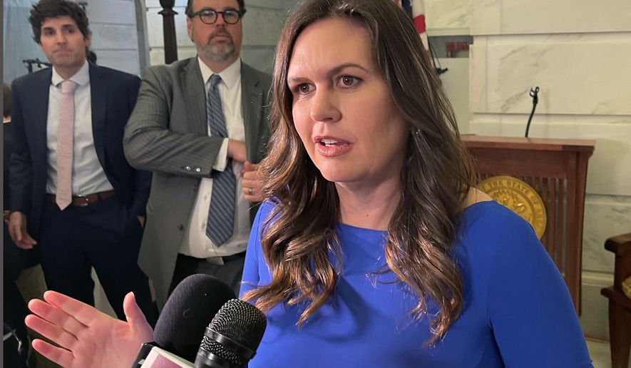 Arkansas Republican gubernatorial candidate Sarah Sanders talks to reporters at the Arkansas state Capitol in Little Rock, Ark., on Feb. 22, 2022, after filing paperwork to run for governor. (AP Photo/Andrew DeMillo, File)