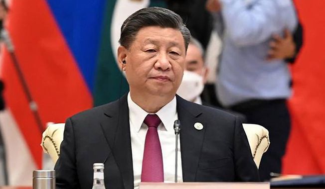 In this handout photo released by Uzbekistan Foreign Ministry, Chinese President Xi Jinping attends the Shanghai Cooperation Organization (SCO) summit in Samarkand, Uzbekistan, Friday, Sept. 16, 2022. (Uzbekistan Presidential Press Service via AP) ** FILE **