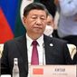 In this handout photo released by Uzbekistan Foreign Ministry, Chinese President Xi Jinping attends the Shanghai Cooperation Organization (SCO) summit in Samarkand, Uzbekistan, Friday, Sept. 16, 2022. (Uzbekistan Presidential Press Service via AP) ** FILE **