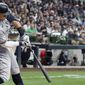 New York Yankees&#x27; Aaron Judge hits a single during the second inning of a baseball game against the Milwaukee Brewers Friday, Sept. 16, 2022, in Milwaukee. (AP Photo/Morry Gash)