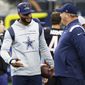 An injured Dallas Cowboys quarterback Dak Prescott, left, talks with head coach Mike McCarthy, right, prior to an NFL football game Sunday, Sept. 18, 2022, in Arlington, Tx. (AP Photo/Ron Jenkins)