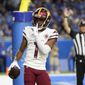 Washington Commanders wide receiver Jahan Dotson (1) celebrates after making a reception for a 2-point conversion during the second half of an NFL football game against the Detroit Lions Sunday, Sept. 18, 2022, in Detroit. (AP Photo/Paul Sancya) **FILE**