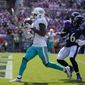 Miami Dolphins wide receiver Jaylen Waddle (17) scores a touchdown during the first half of an NFL football game against the Baltimore Ravens, Sunday, Sept. 18, 2022, in Baltimore. (AP Photo/Julio Cortez) **FILE**