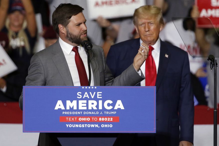 J.D. Vance, the Republican candidate for U.S. senator for Ohio, is accompanied by former President Donald Trump as he speaks at a campaign rally in Youngstown, Ohio., Saturday, Sept. 17, 2022. (AP Photo/Tom E. Puskar)