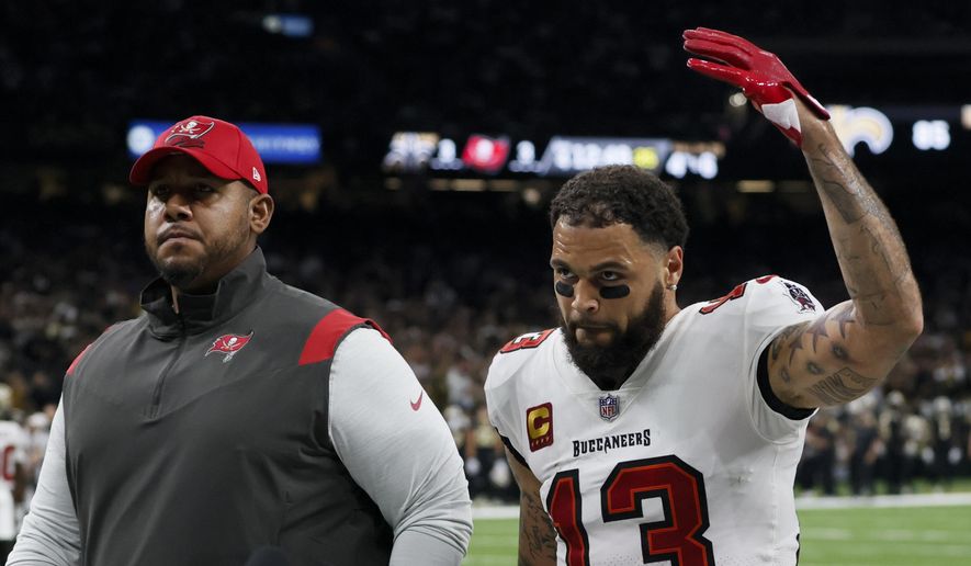 Tampa Bay Buccaneers wide receiver Mike Evans leaves the field after being thrown out of the game against the New Orleans Saints during the first half of an NFL football game in New Orleans, Sunday, Sept. 18, 2022. (AP Photo/Butch Dill) **FILE**