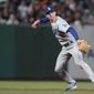 Los Angeles Dodgers shortstop Trea Turner throws out San Francisco Giants&#39; Heliot Ramos at first base during the fifth inning of a baseball game in San Francisco, Saturday, Sept. 17, 2022. (AP Photo/Jeff Chiu) **FILE**