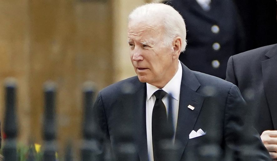 US President Joe Biden arrives at Westminster Abbey on the day of Queen Elizabeth II funeral in central London, Monday, Sept. 19, 2022. The Queen, who died aged 96 on Sept. 8, will be buried at Windsor alongside her late husband, Prince Philip, who died last year. ( James Manning/Pool Photo via AP)