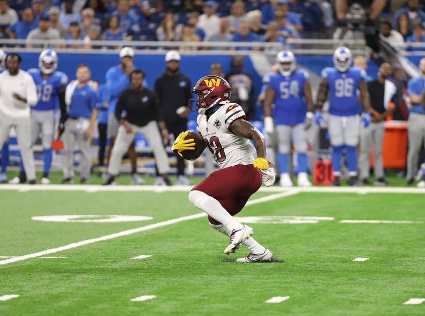 Washington Commanders&#39; RB J.D. McKissic (23) runs with the ball towards the endzone at the Washington Commanders vs the Detroit Lions at Ford Field in Detroit Michigan on September 18th 2022 (Photo: Alyssa Howell)