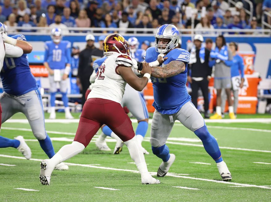 Washington Commanders&#39; DE Daniel Wise (92) defends the line holding back at the Detroit lineman at the Washington Commanders vs the Detroit Lions at Ford Field in Detroit Michigan on September 18th 2022 (Photo: Alyssa Howell)