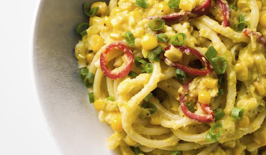 This image released by Milk Street shows a recipe for Bucatini with Sweet Corn and Scallions. (Milk Street via AP)