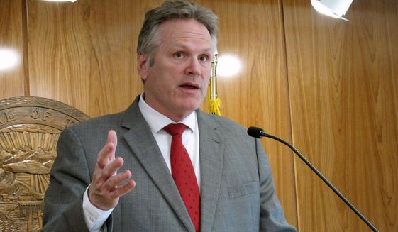 Alaska Gov. Mike Dunleavy speaks to reporters during a news conference at the state Capitol on April 28, 2022, in Juneau, Alaska. Nearly every single Alaskan got a financial windfall amounting to more than $3,000 on Tuesday, Sept. 20, 2022, the day the state began distributing payments from Alaska&#39;s investment fund that has been seeded with money from the state&#39;s oil riches. (AP Photo/Becky Bohrer, File)