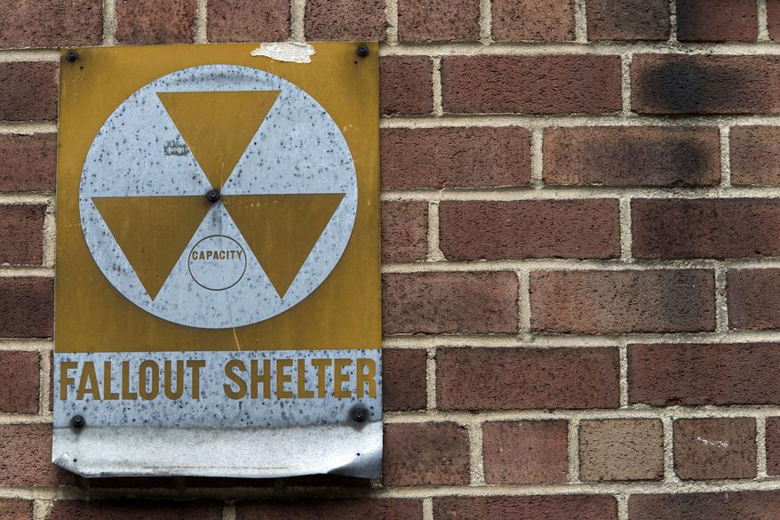 A fallout shelter sign hangs on a building on East 9th Street in New York on Jan. 16, 2018. (AP Photo/Mary Altaffer) **FILE**